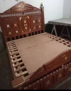 taali wooden bed almost new less used