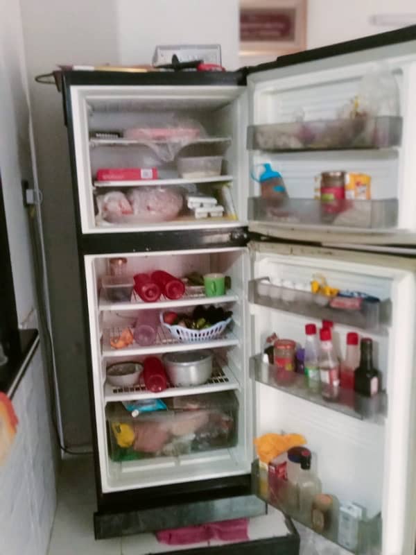 glass door fridge okay condition look like new 2