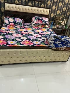 double bed with side tables