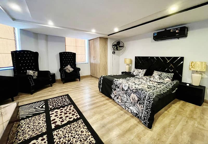 Daily Basis "Indulge in Elegance: Luxurious One-Bedroom Furnished Apartment for Rent in Gulberg Heights" 1