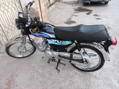 Honda cd 70 2024 black 5200km driven total genuine. 0