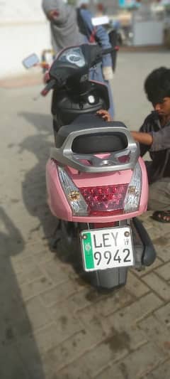 unidet ki 100cc scooty