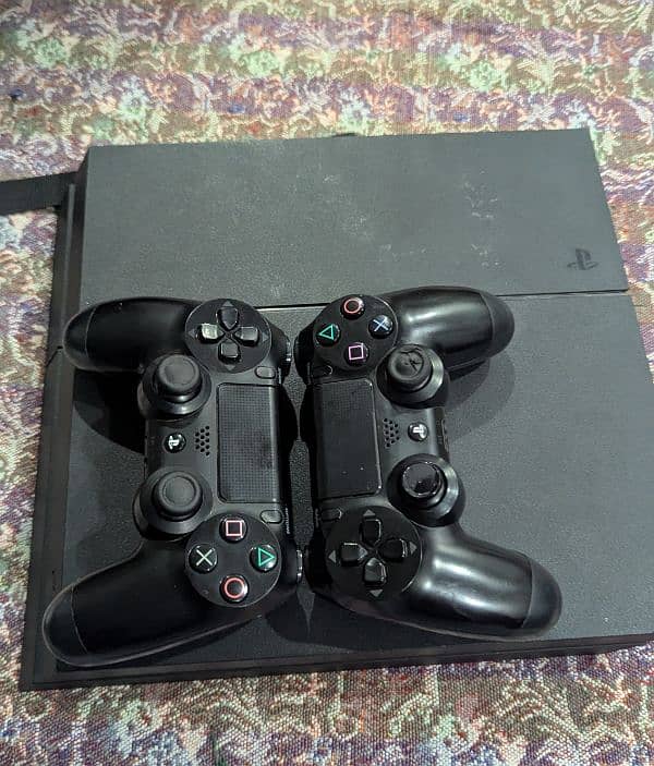 Playstation 4 Fat 500 gb with 2 Dual shock controllers. 1