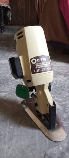 Fabric cloths cutting machine (OCTA Brand).