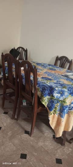 pure wooden dining table with 6 chairs