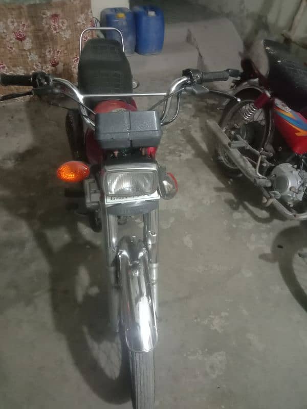 Honda CG 125 red colour to stop 2012 model 03083847612 2