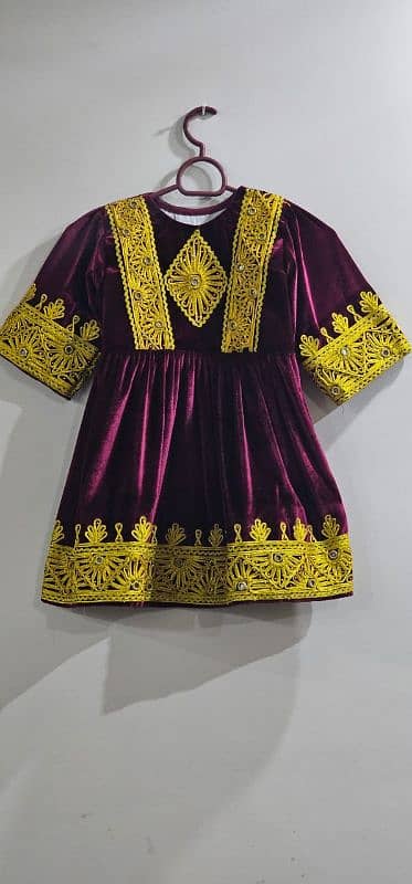 Maroon Velvet dress with golden lace work on it 0