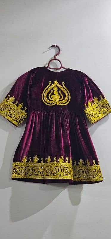 Maroon Velvet dress with golden lace work on it 1