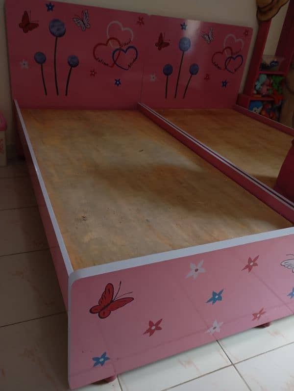 two single bed, cupboard,bookrack,small dressing table for kids 5