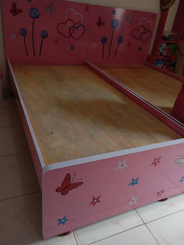 two single bed, cupboard,bookrack,small dressing table for kids 6