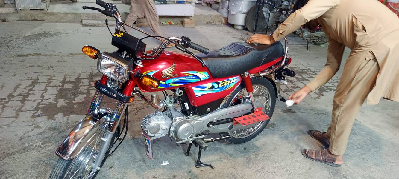 Honda CD 70 2024 4