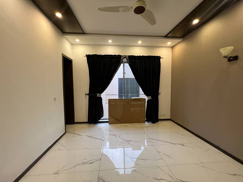 Chic 1-Kanal Fully Furnished Home With 5 Beds, 2 Kitchens, & More In DHA Phase 4 Block HH 6