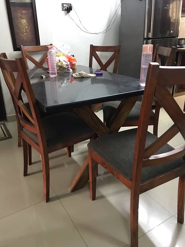 dinning table with granite  top and 6 chairs 1