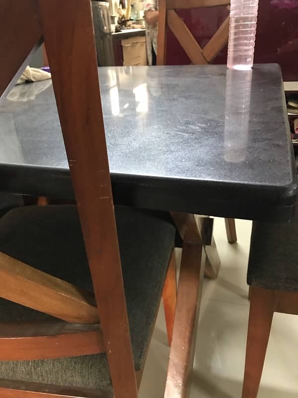 dinning table with granite  top and 6 chairs 2