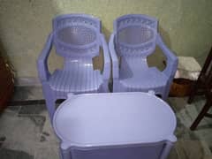 2 Plastic chairs with Table