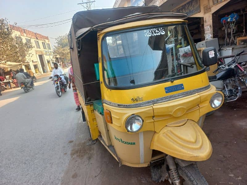 12 seater United  Riksha 2021 4