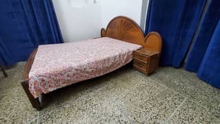 king size bed with attached side tables and mattress