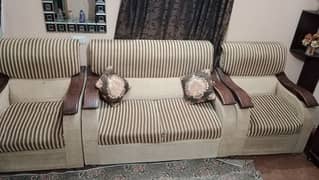 7 seater sofa for sale with covers and cushions.