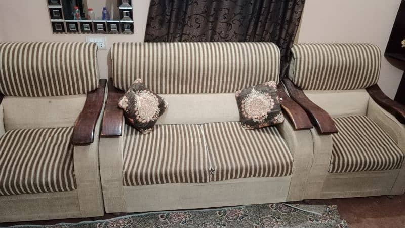 7 seater sofa for sale with covers and cushions. 1