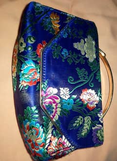 Blue color hand bag embroidery