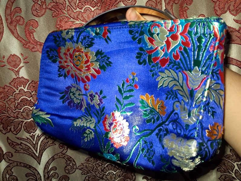 Blue color hand bag embroidery 1