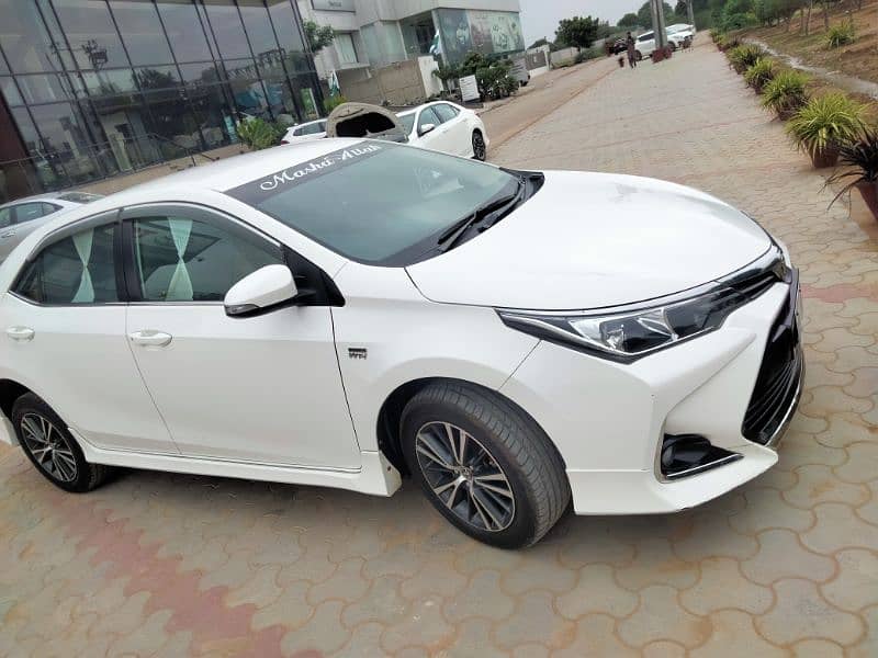 Toyota Corolla Altis 2022 plz chasky waly door rahen 1