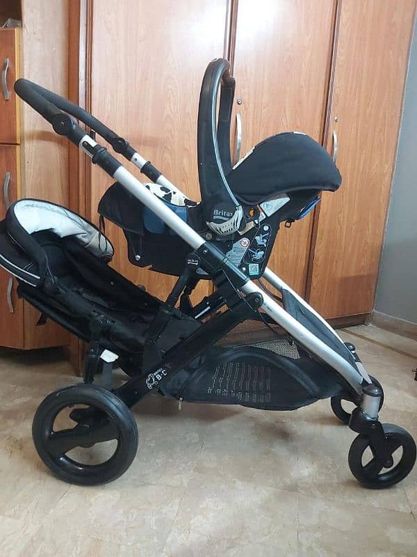 Britax uk twin stroller carrycot plus carseat 1