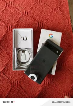 Google Pixel 7a (Just box open). 0