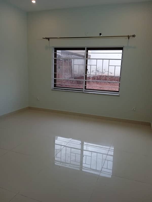 10marla 3beds DD TV lounge kitchen attached baths neat clean ground portion for rent in G 13 4 islamabad 1