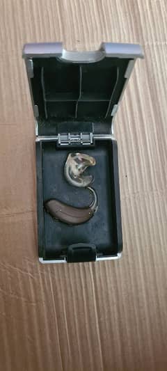 oticon hearing aid 100% new