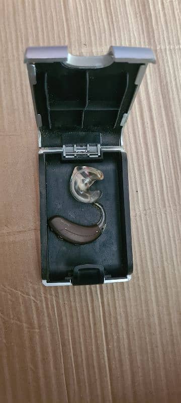 oticon hearing aid 100% new 0