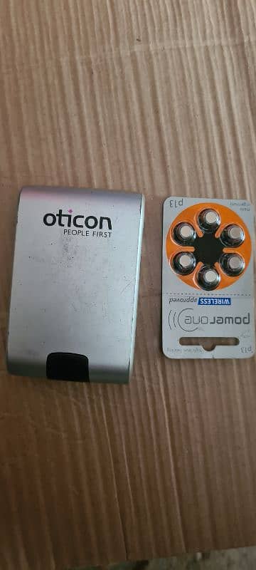 oticon hearing aid 100% new 3