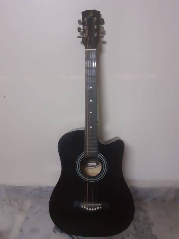 Beginners size guitar in a good condition. 0