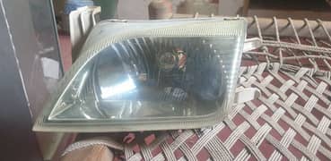 cultus left side janiun headlight. 0