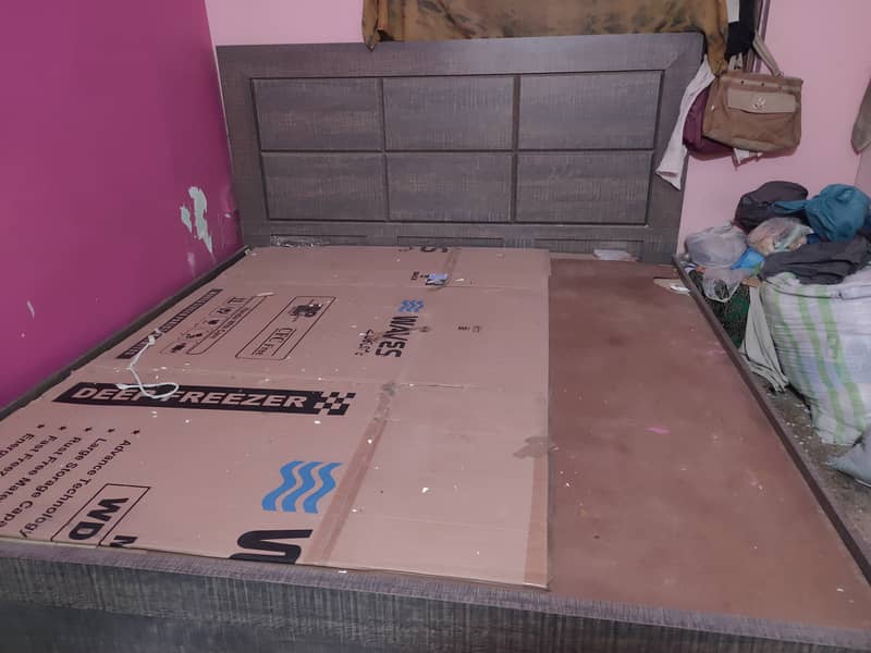 Wooden double bed for sale 2