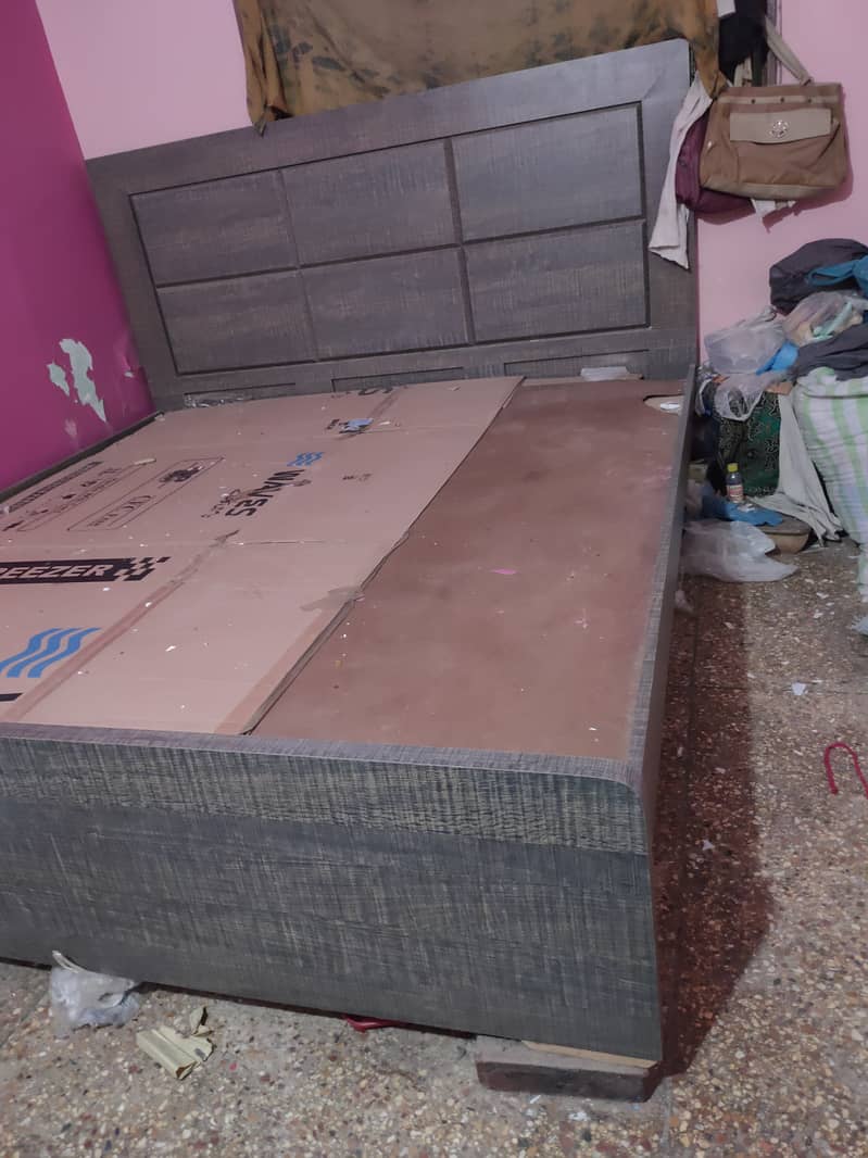 Wooden double bed for sale 3