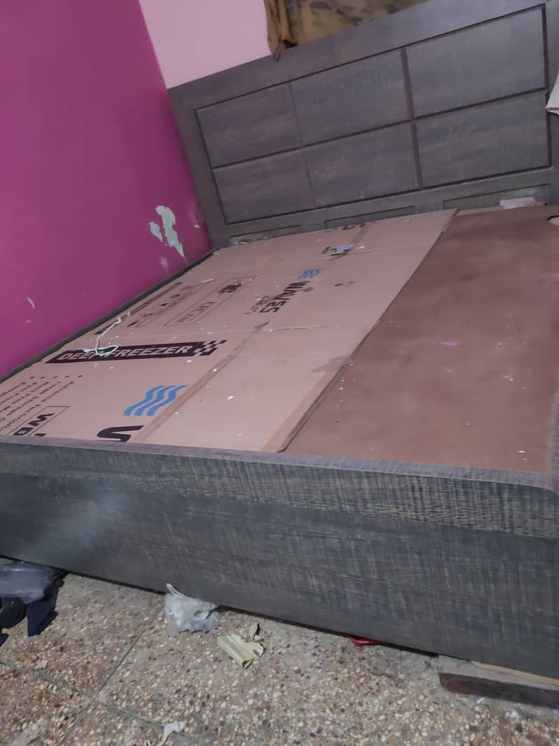 Wooden double bed for sale 4