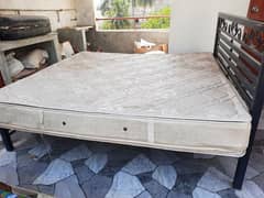 Rot Iron Bed with spring mattress 6ft x 6.5 ft