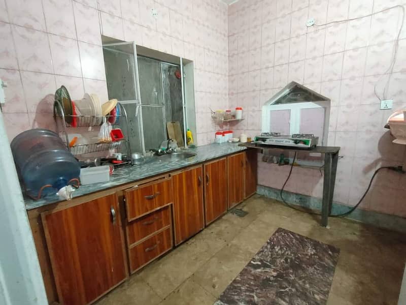 Running hostel building for rent setup for sale in Sultan town near Ali town station hostels area profitable building 1