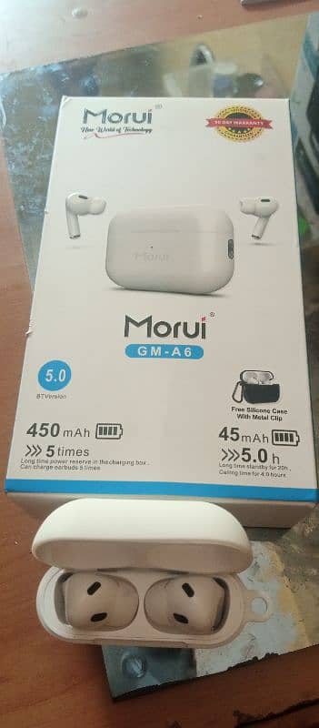 morui air pods for sale only 2 day used with full box and deta cable 2