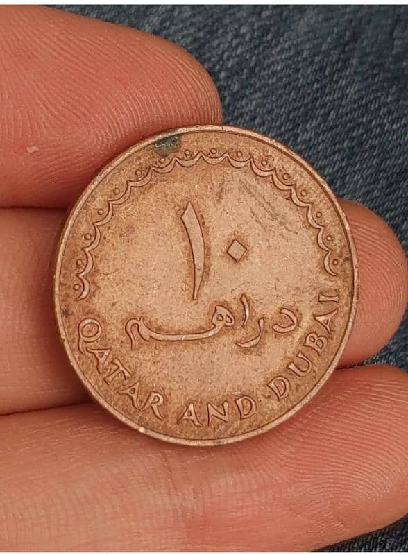 old coin qatar and Dubai coin 1386 1