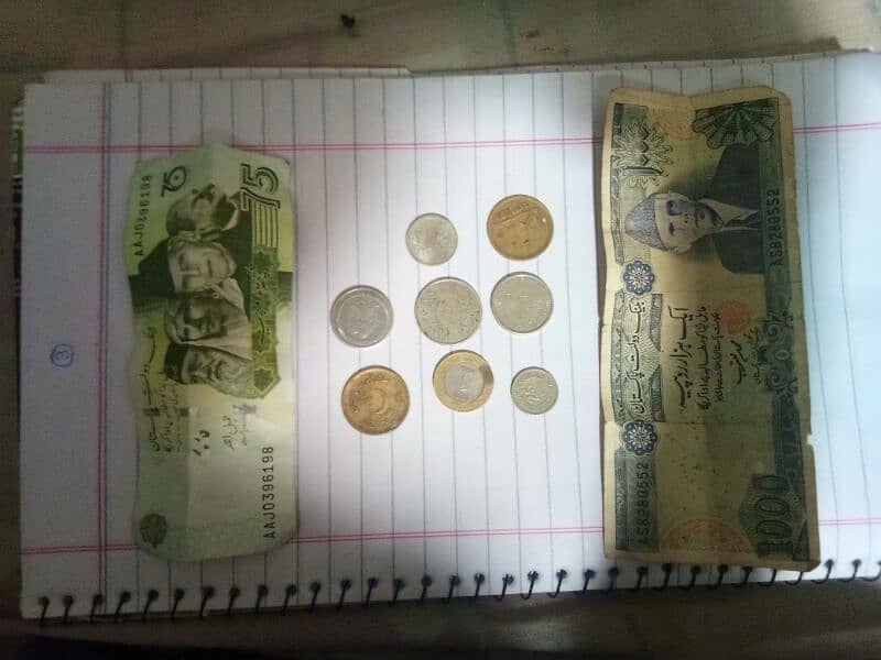 Purana 1000 note and  different coins 0