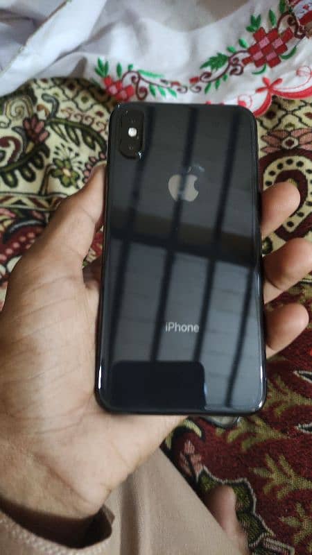 I phone xs 64 GB face id true tone ok non pta water pek ni ha 88 helth 4