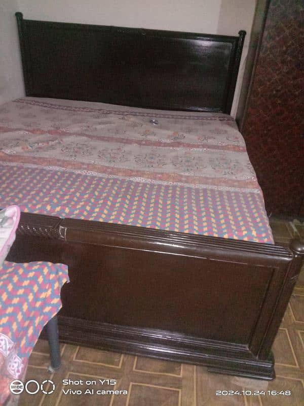 double bed brown color nice condition 0