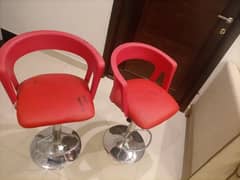 Red revolving chairs