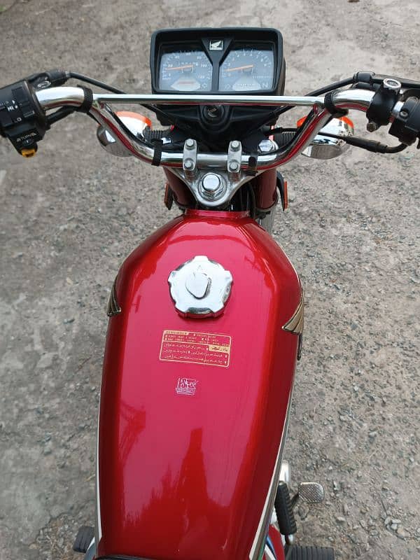 Honda 125 red color 2023 model urgent sell all original 9