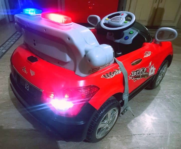 Kids imported police car lights,music,battery,all ok no need repairing 4