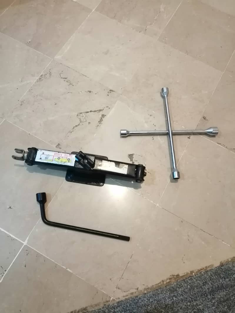 New Car jack, screw opener, wrench. 2