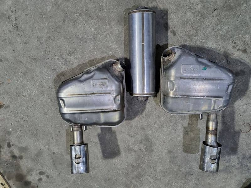 2 mufflers and one resonator original civic rs turbo 0