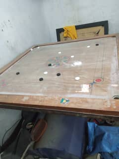 A 4.5 x 4.5 carrom board 54 cm